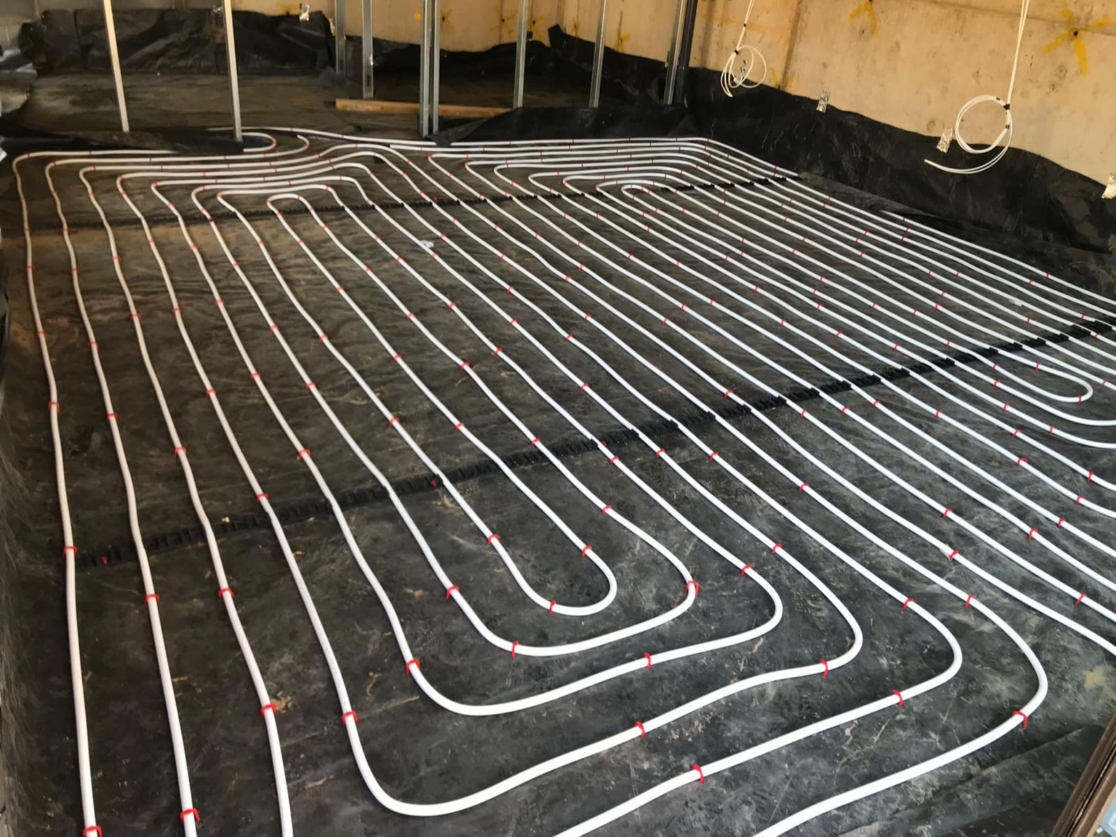 Underfloor heating pipework laid on insulation